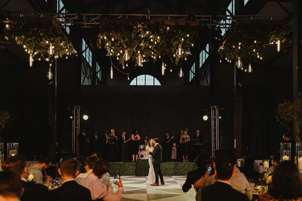 couple's first dance at their eastern market wedding