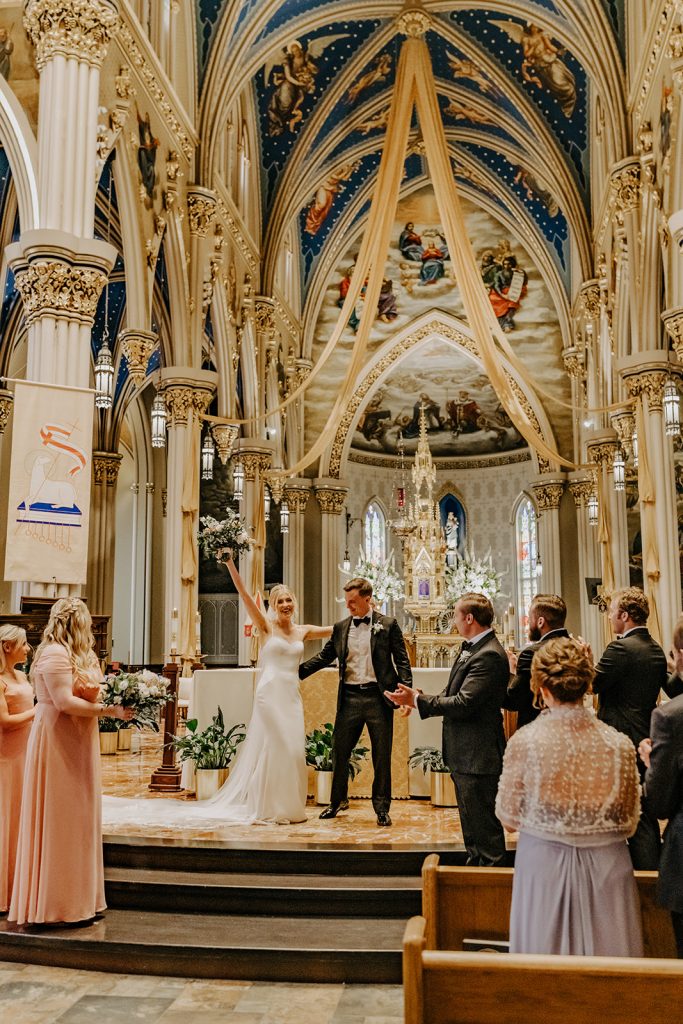 announcement as husband and wife as part of wedding at Notre Dame Basilica of the Sacred Heart