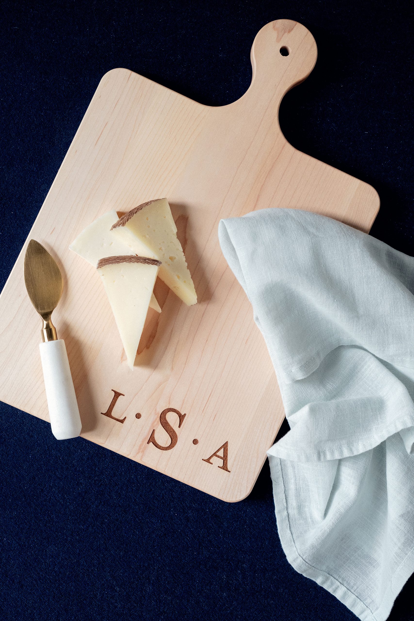 Stockists and wholesale vendors for Leah E. Moss Designs | monogrammed cutting board, Photo: Erin Schmidt Photography