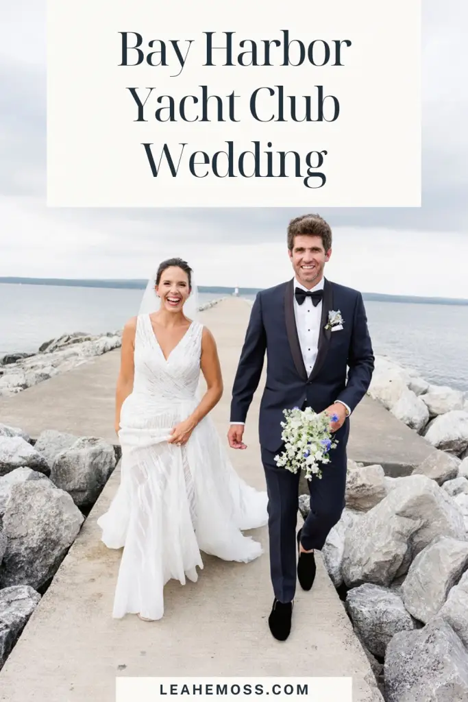 Bride and groom on the pier at their Bay Harbor Yacht Club wedding