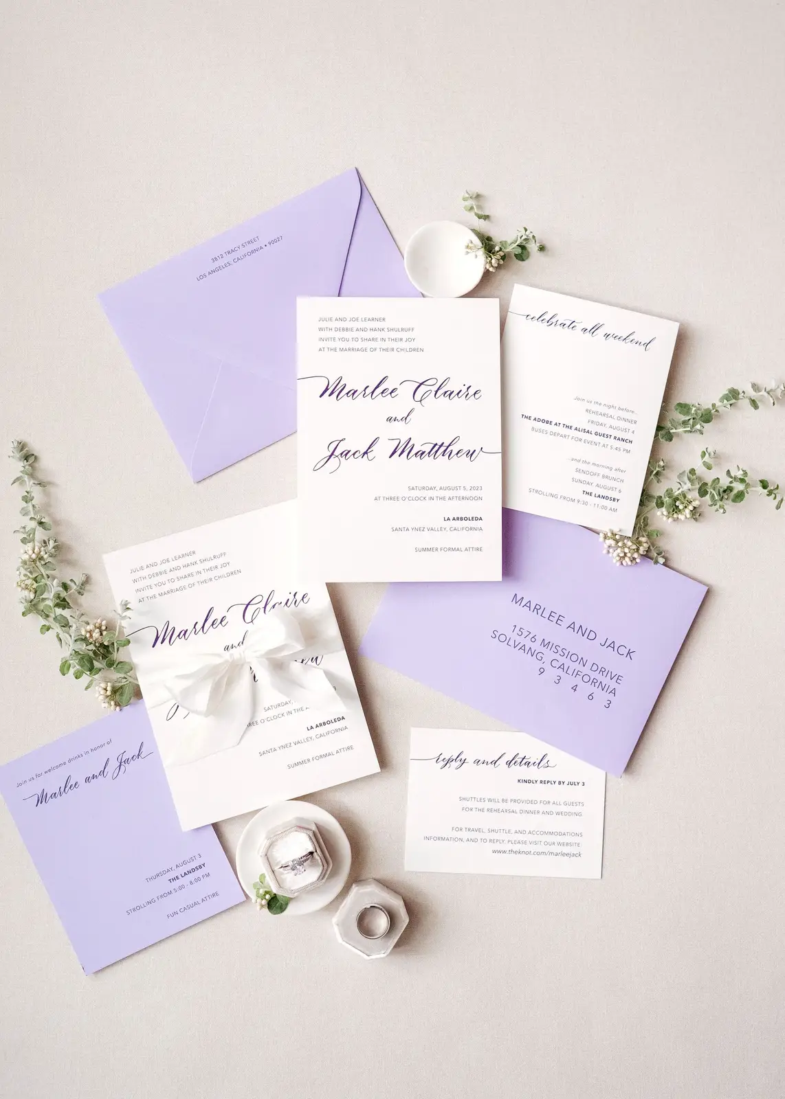 unique wedding invitation flat lay styled