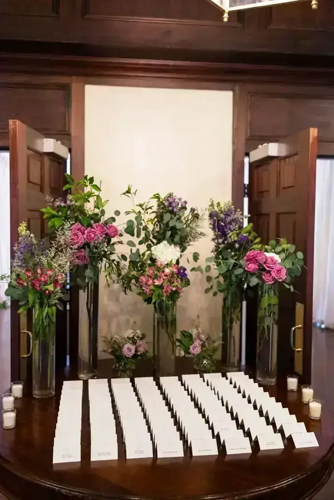 escort card display table at a Mansion at Oyster Bay wedding - from Leah E. Moss Designs