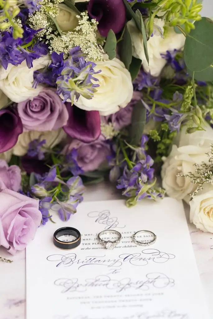 purple and grey invitation with rings for a Mansion at Oyster Bay wedding - from Leah E. Moss Designs