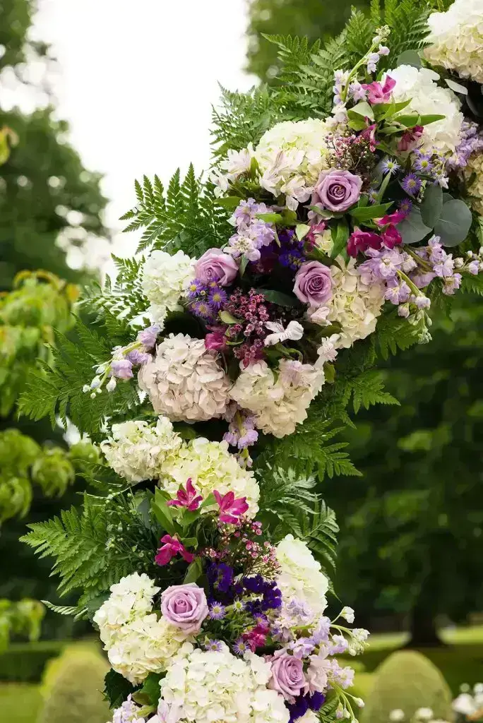 purple floral arch detail from Mansion at Oyster Bay wedding - from Leah E. Moss Designs