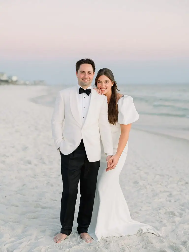 Bride and groom portrait on the beach at sunset during their Rosemary Beach wedding