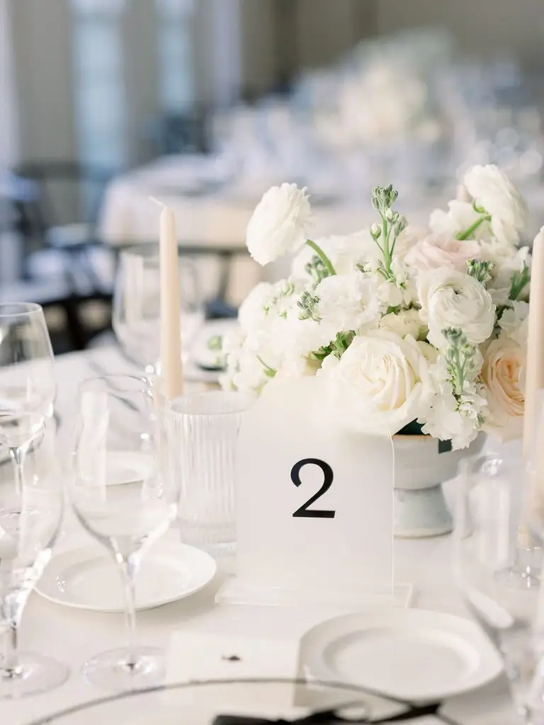 Frosted clear acrylic table numbers at a Rosemary Beach wedding reception